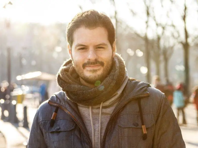 Man standing outdoors representing male fertility testing