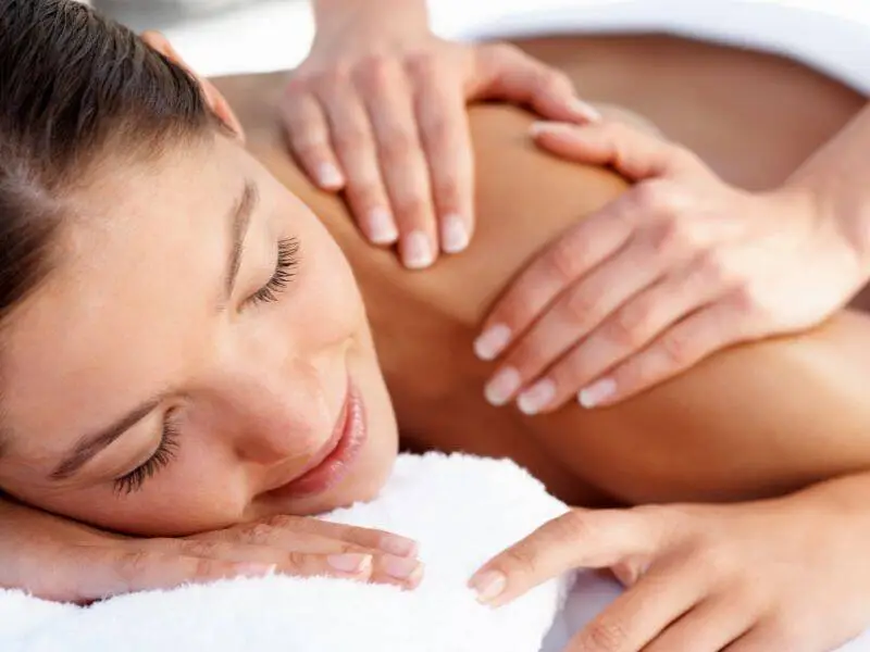 Woman receiving a relaxing massage treatment
