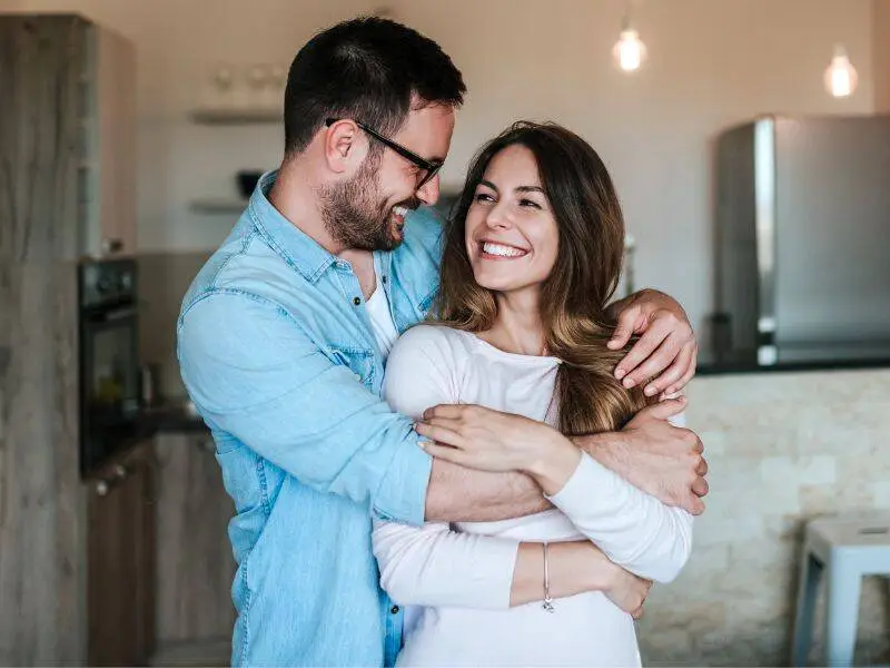 Couple at home representing assisted reproductive technology and fertility treatment