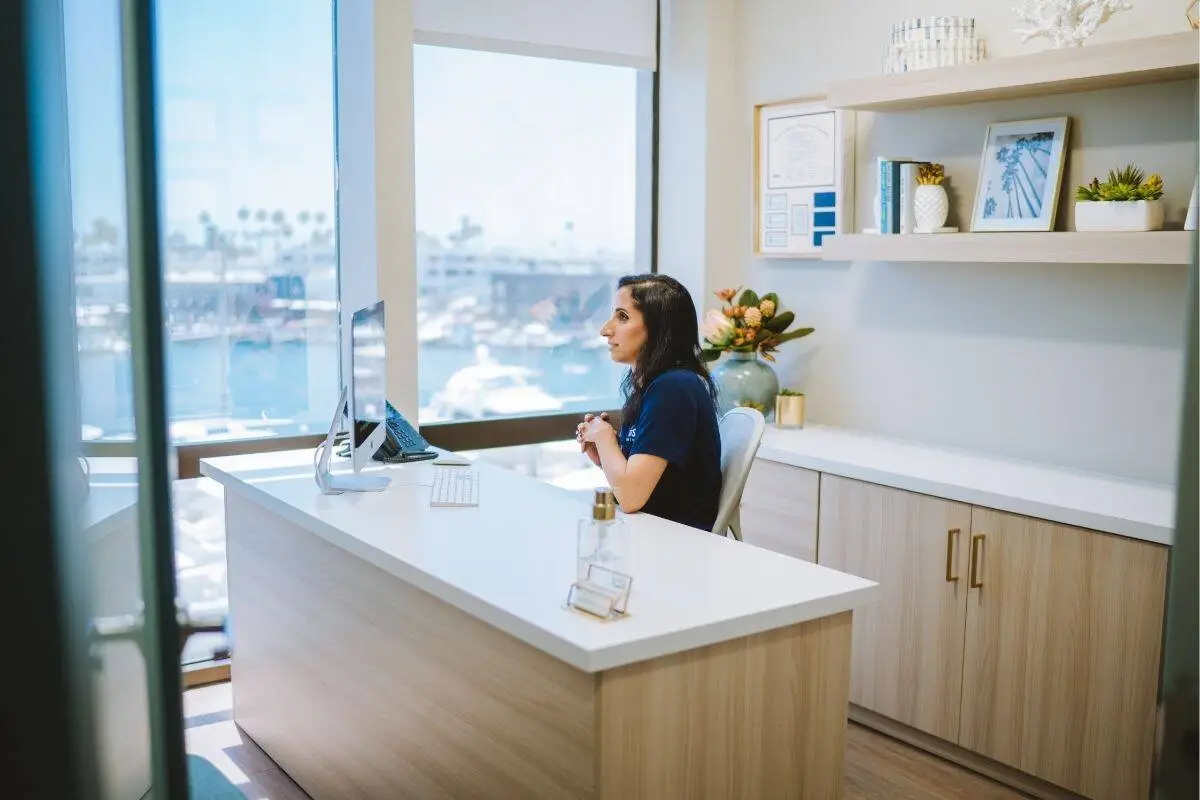 Fertility specialist sitting in a clinic office